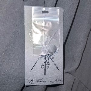 Holiday dress by La femme en Noir.  V-neck.  Long sleeves.  Flowy.  Mid-length.